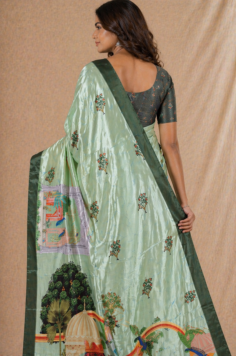 Elegant Sage Green Silk Saree With Royal Elephant & Heritage Print