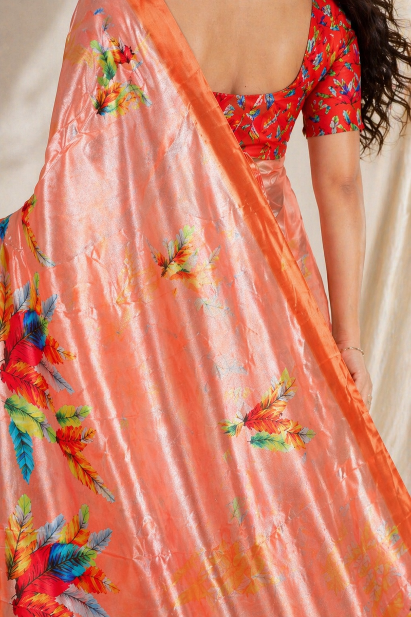 Vibrant Peach Feather Print Chiffon Silk Saree