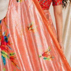 Vibrant Peach Feather Print Chiffon Silk Saree
