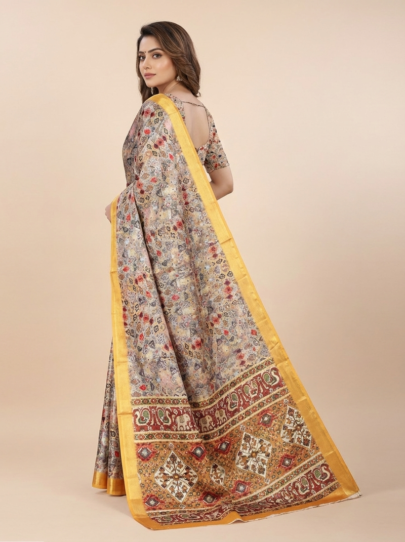 Royal Ivory Heritage Print Saree with Golden Border & Elephant Motif Pallu